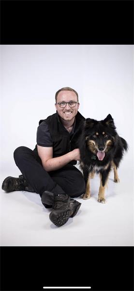 Tom Candy w/  black and tan dog